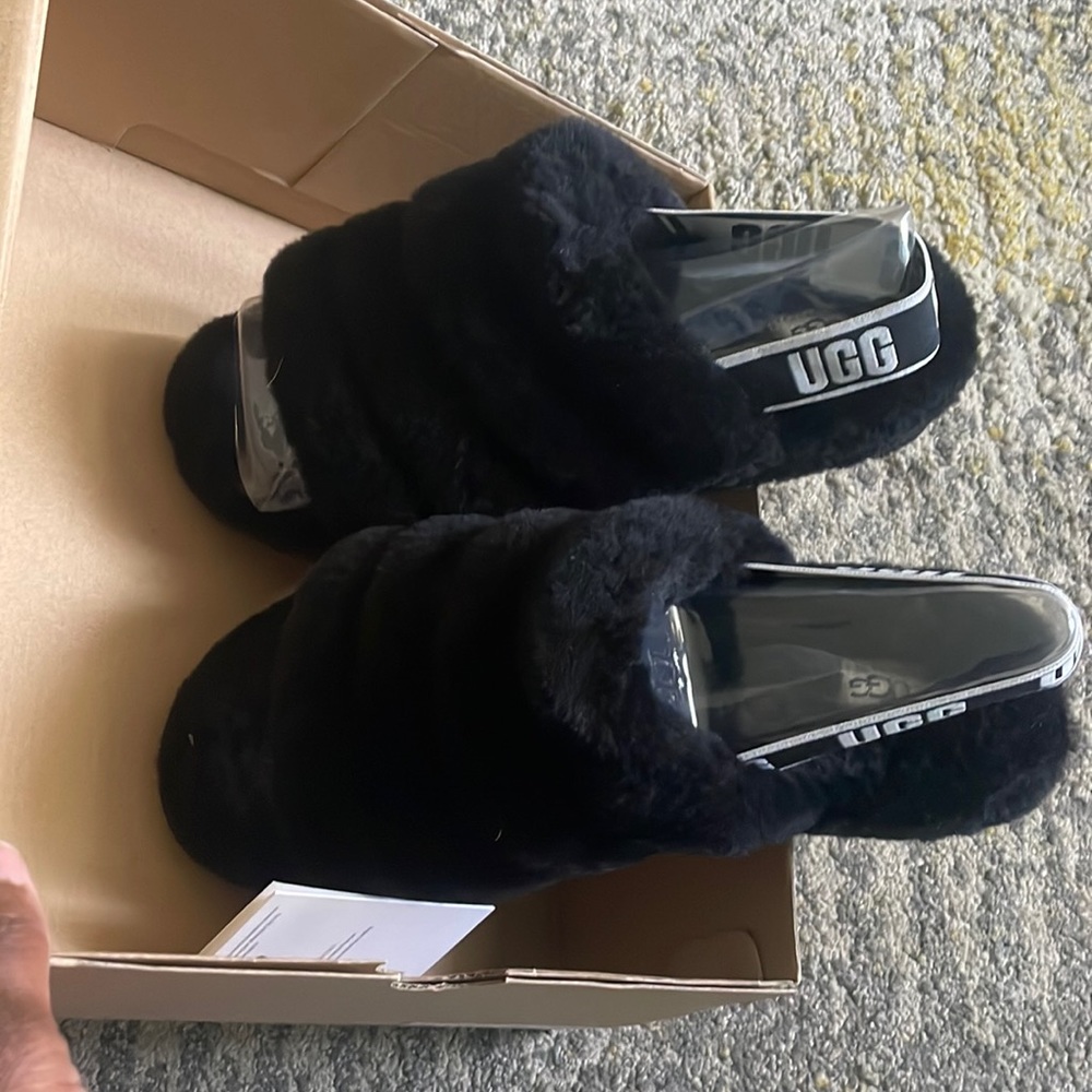 New black Ugg slides tried on, never worn.